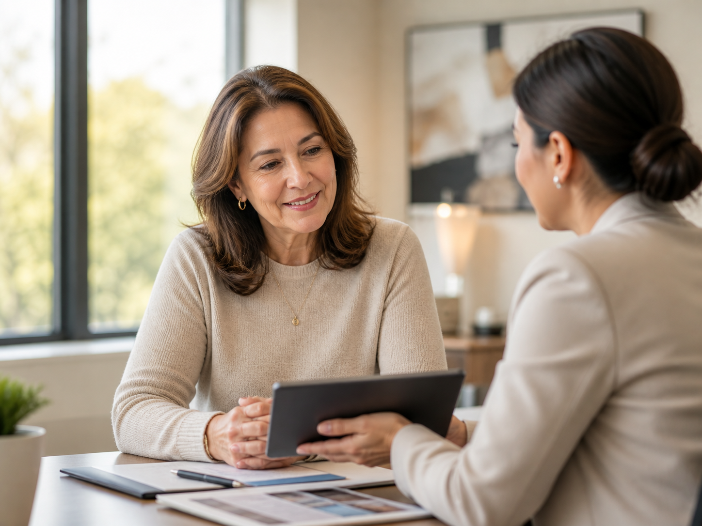 Patient in a warm consultation with an orthopedic coordinator, reviewing options together